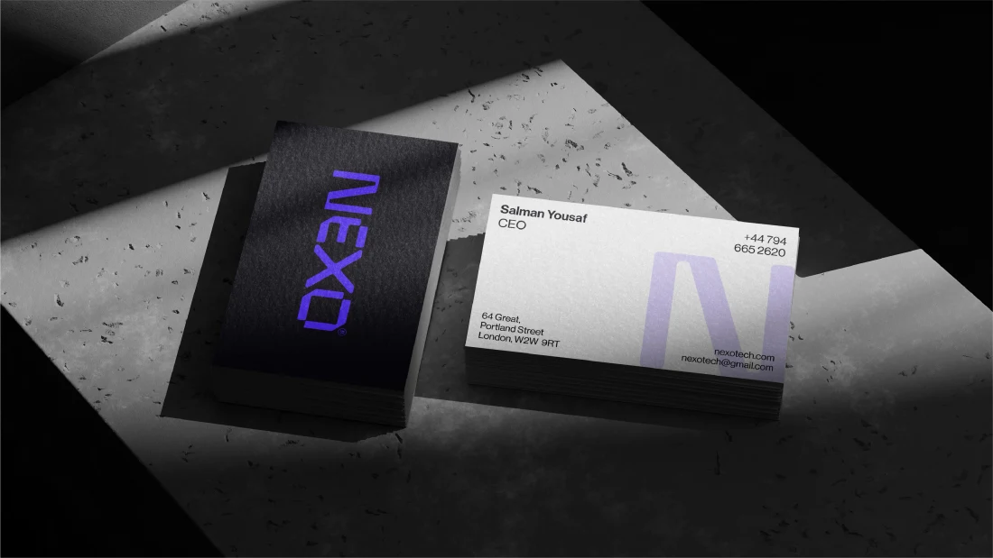 NEXO purple, black and white business card system.